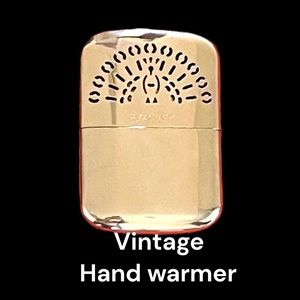 Vintage “60” metal hand warmer